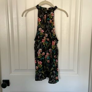 Express women’s blouse size M. Black with multicolor floral print.